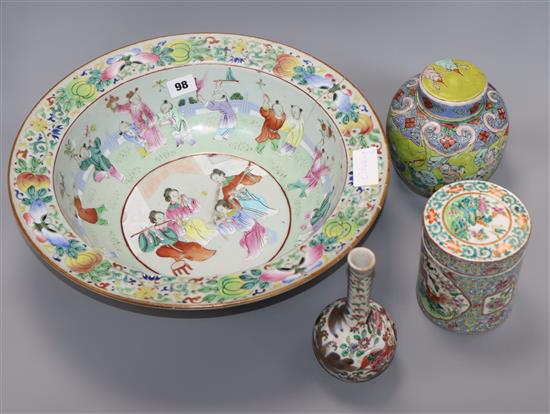 A 19th century Chinese famille rose basin, two jars and covers and a vase diameter 38cm